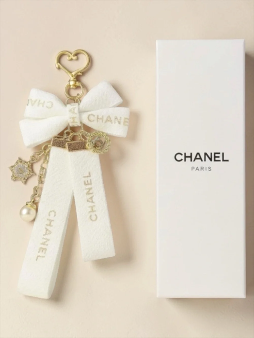 Chanel White Bow Charm Keychain Charm NIB - Picture 13 of 13